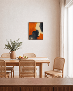 Orange Cliff Cut unframed print is shown framed for styling in a dining room; frame not included