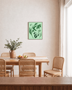 Green Wildflower unframed print is shown framed for styling in a dining room; frame not included