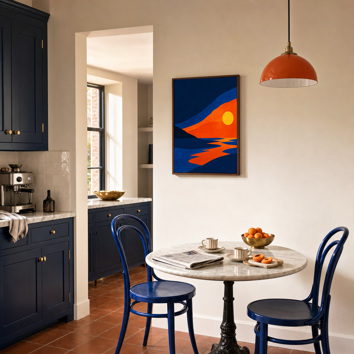 Dark Land Wedge at Sunset abstract sunset wall art: unframed print is shown framed for styling in a navy cabinet kitchen dining corner; frame not included