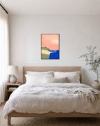 Blue Cliff Pink unframed print is shown framed for styling in a bedroom; frame not included