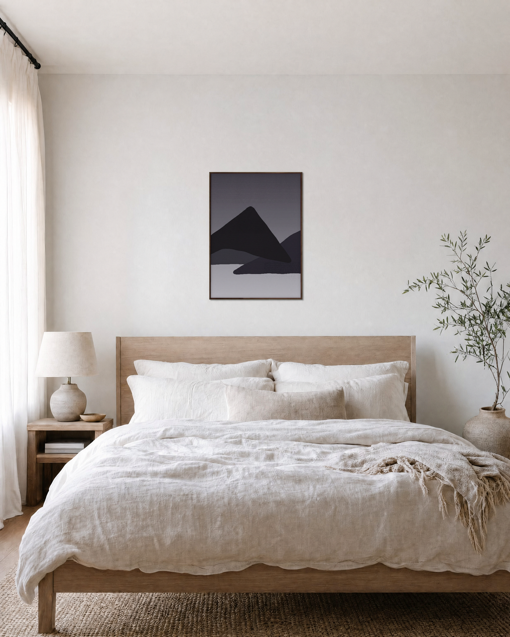 Charcoal Ridges unframed print is shown framed for styling in a bedroom; frame not included