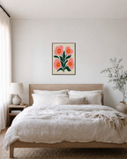 Coral Quartet four coral bloom print: unframed print is shown framed for styling in a bedroom; frame not included
