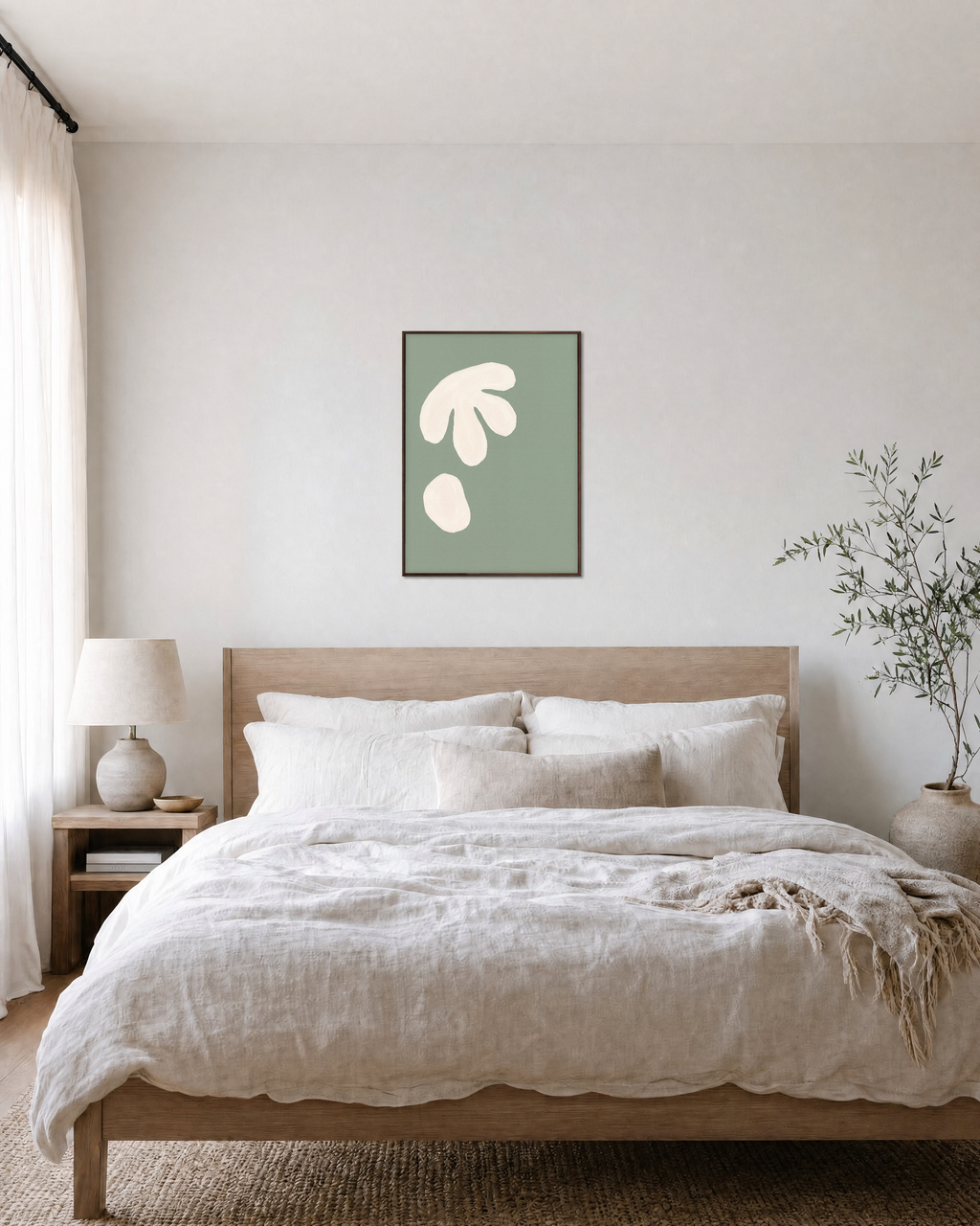 Cream Cutouts Sage unframed print is shown framed for styling in a bedroom; frame not included