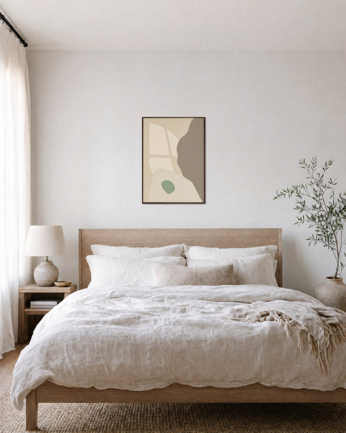 Pale Peach Against Sage pale peach and sage shapes wall art print: unframed print is shown framed for styling in a bedroom; frame not included