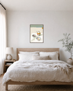 Oil Pourer Table unframed print is shown framed for styling in a bedroom; frame not included
