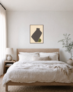 Olive Vessel unframed print is shown framed for styling in a bedroom; frame not included