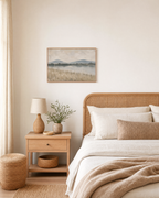 Still Morning landscape prints: unframed print is shown framed for styling in a bedroom; frame not included