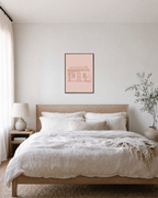 Rust Line Cottage line drawing wall art: unframed print is shown framed for styling in a bedroom; frame not included