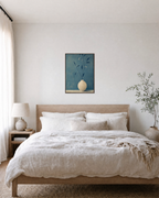 Slate Branch Vessel unframed print is shown framed for styling in a bedroom; frame not included