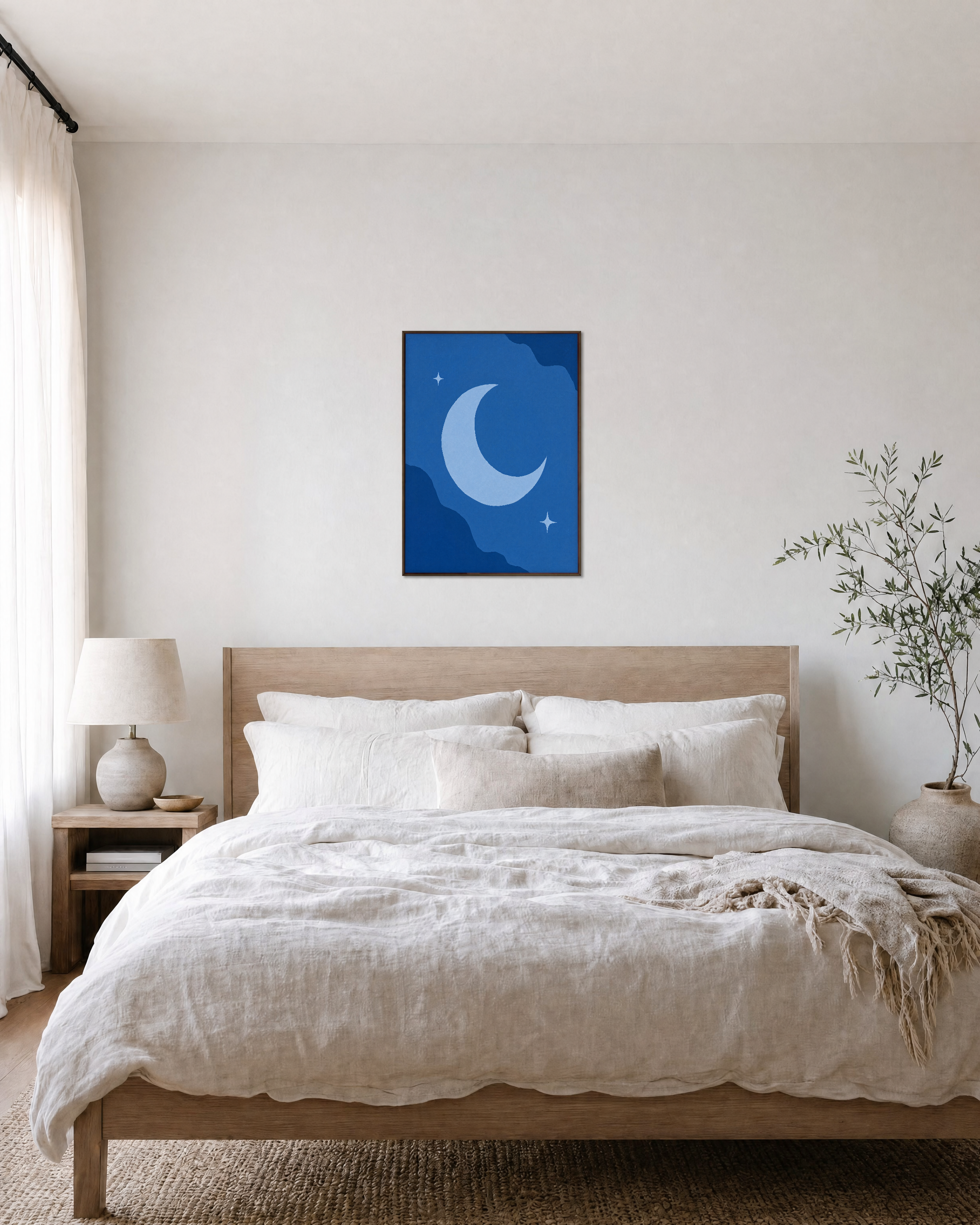 Blue Crescent unframed print is shown framed for styling in a bedroom; frame not included