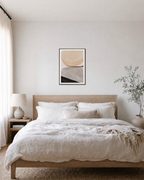 Rust Line and Charcoal Wedge beige and gray abstract wall art print: unframed print is shown framed for styling in a bedroom; frame not included