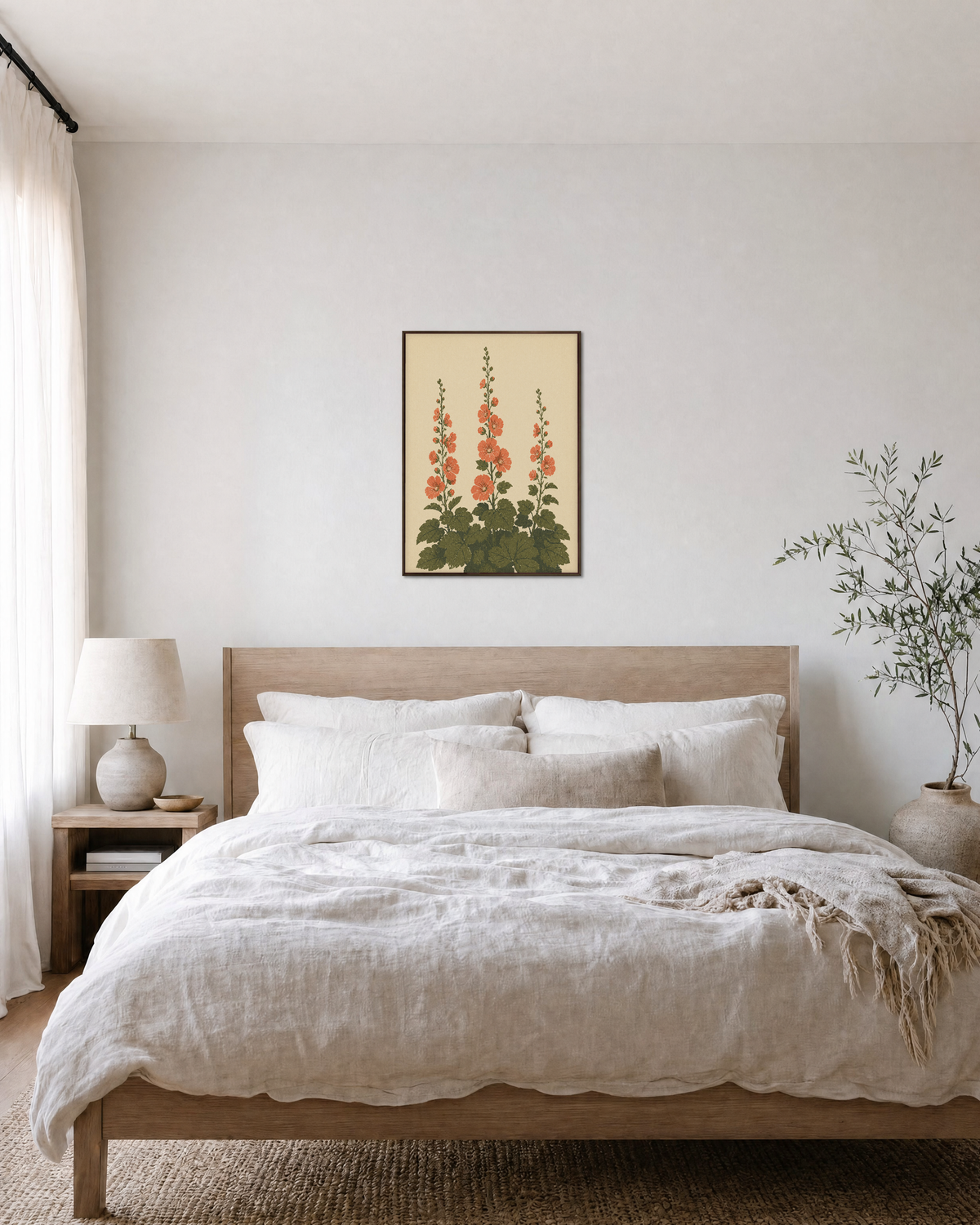 Hollyhock Towers hollyhock wall art: unframed print is shown framed for styling in a bedroom; frame not included