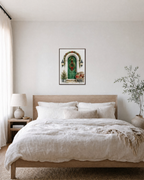 December Door green door print: unframed print is shown framed for styling in a bedroom; frame not included