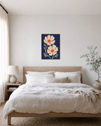 Second Anemone cream anemone wall art: unframed print is shown framed for styling in a bedroom; frame not included