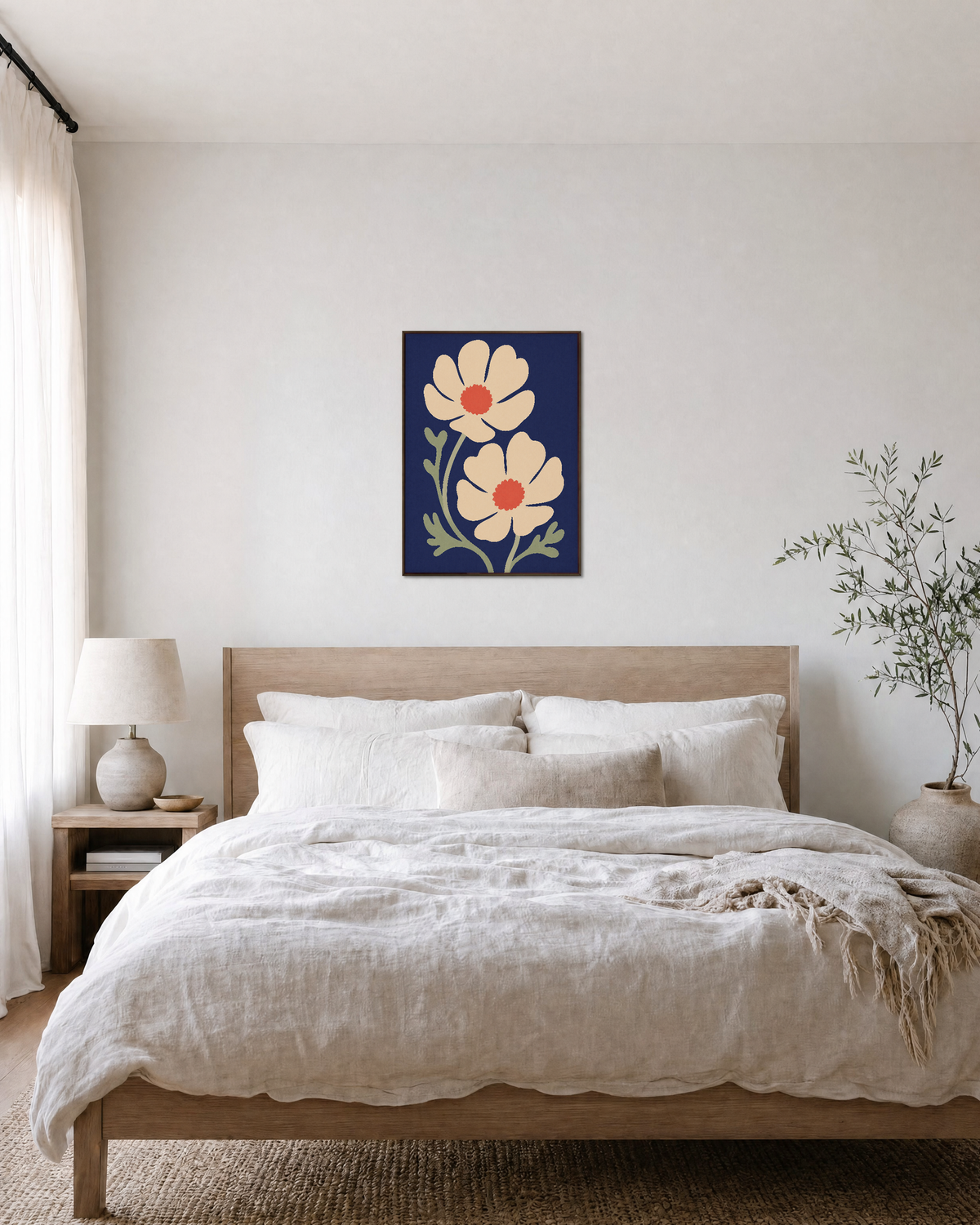 Second Anemone cream anemone wall art: unframed print is shown framed for styling in a bedroom; frame not included