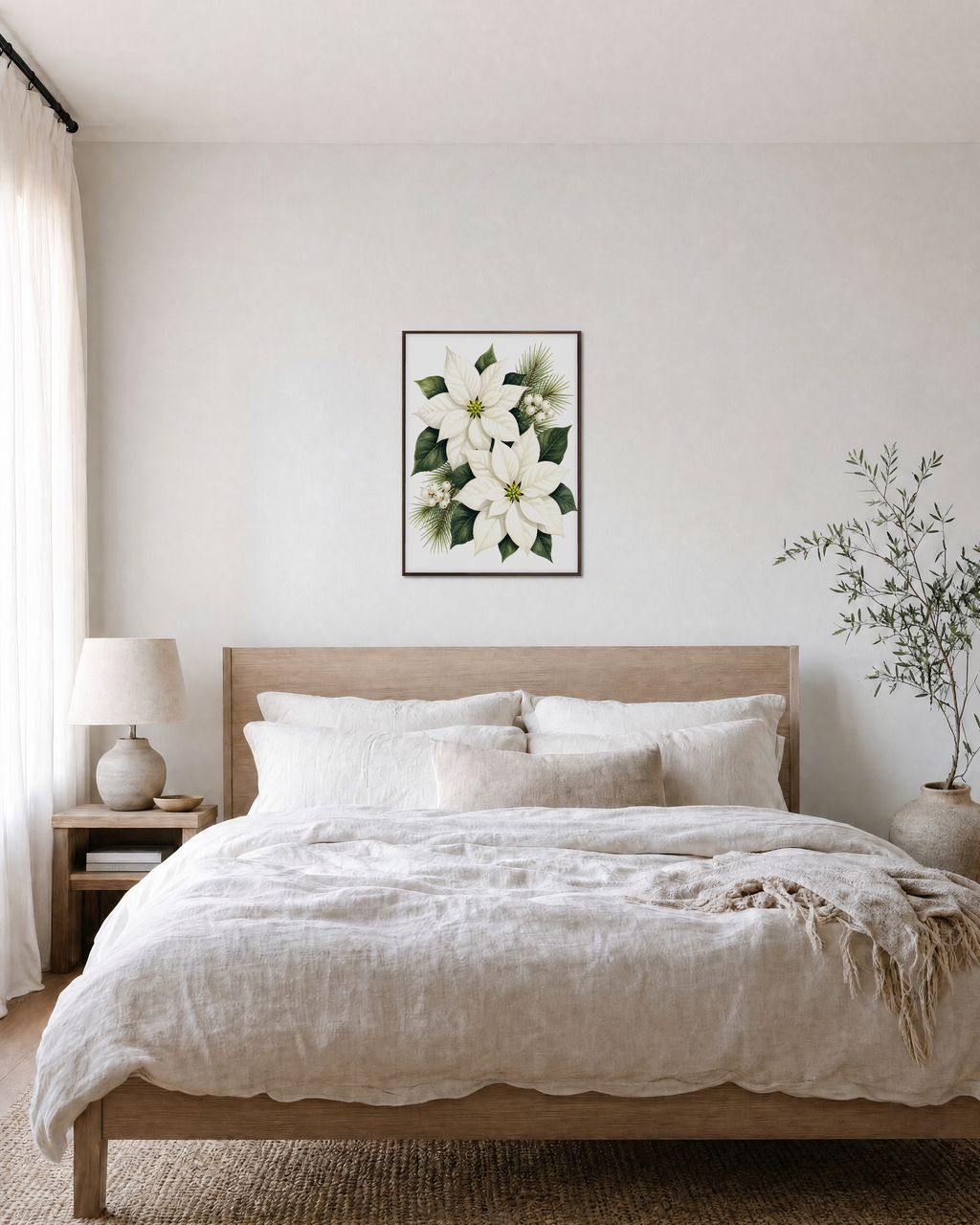 Winter Bloom white poinsettia print: unframed print is shown framed for styling in a bedroom; frame not included