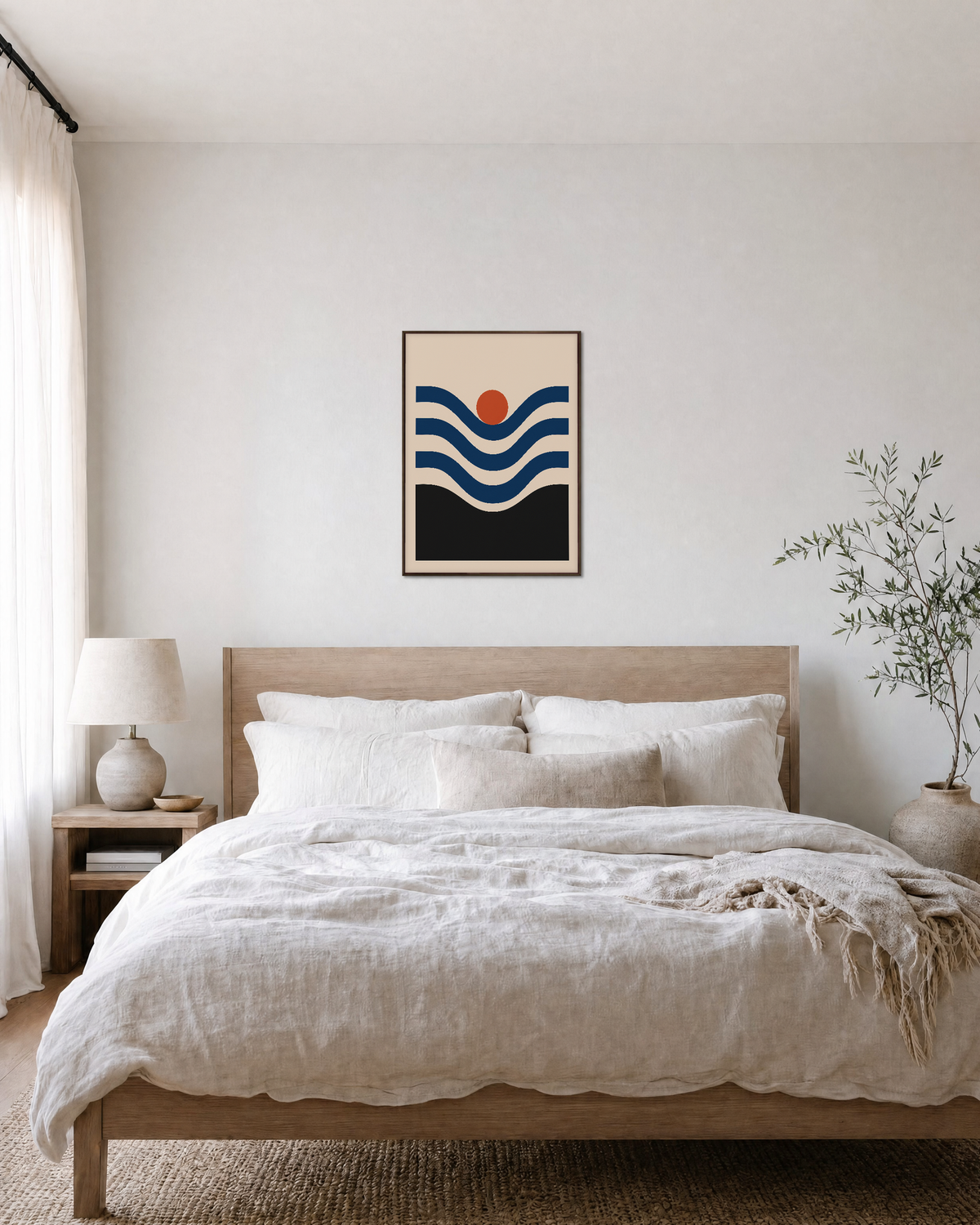 Coral Nest navy wave coral wall art: unframed print is shown framed for styling in a bedroom; frame not included