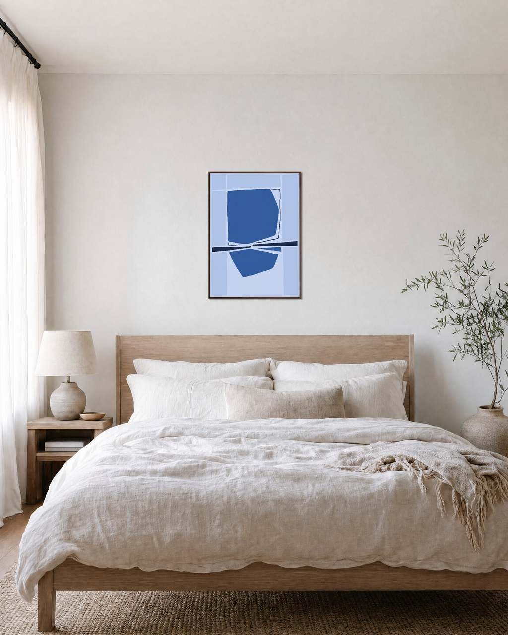 Azure Reflection unframed print is shown framed for styling in a bedroom; frame not included