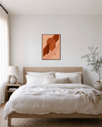 Brown Bands Across Orange Arch burnt orange geometric wall art: unframed print is shown framed for styling in a bedroom; frame not included