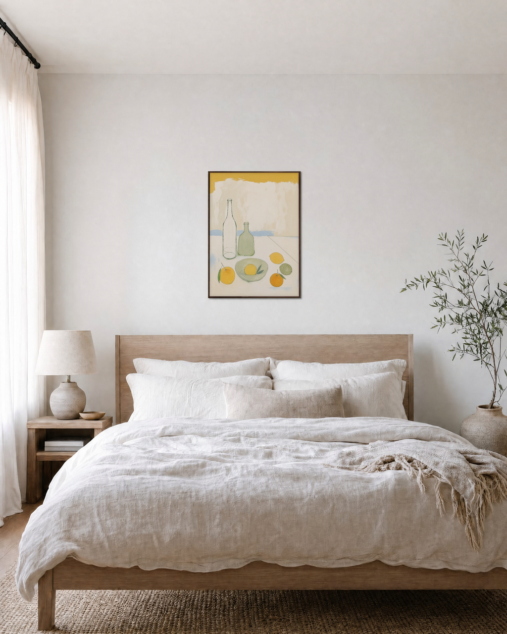 Morning Bottles citrus bottle still life wall art: unframed print is shown framed for styling in a bedroom; frame not included