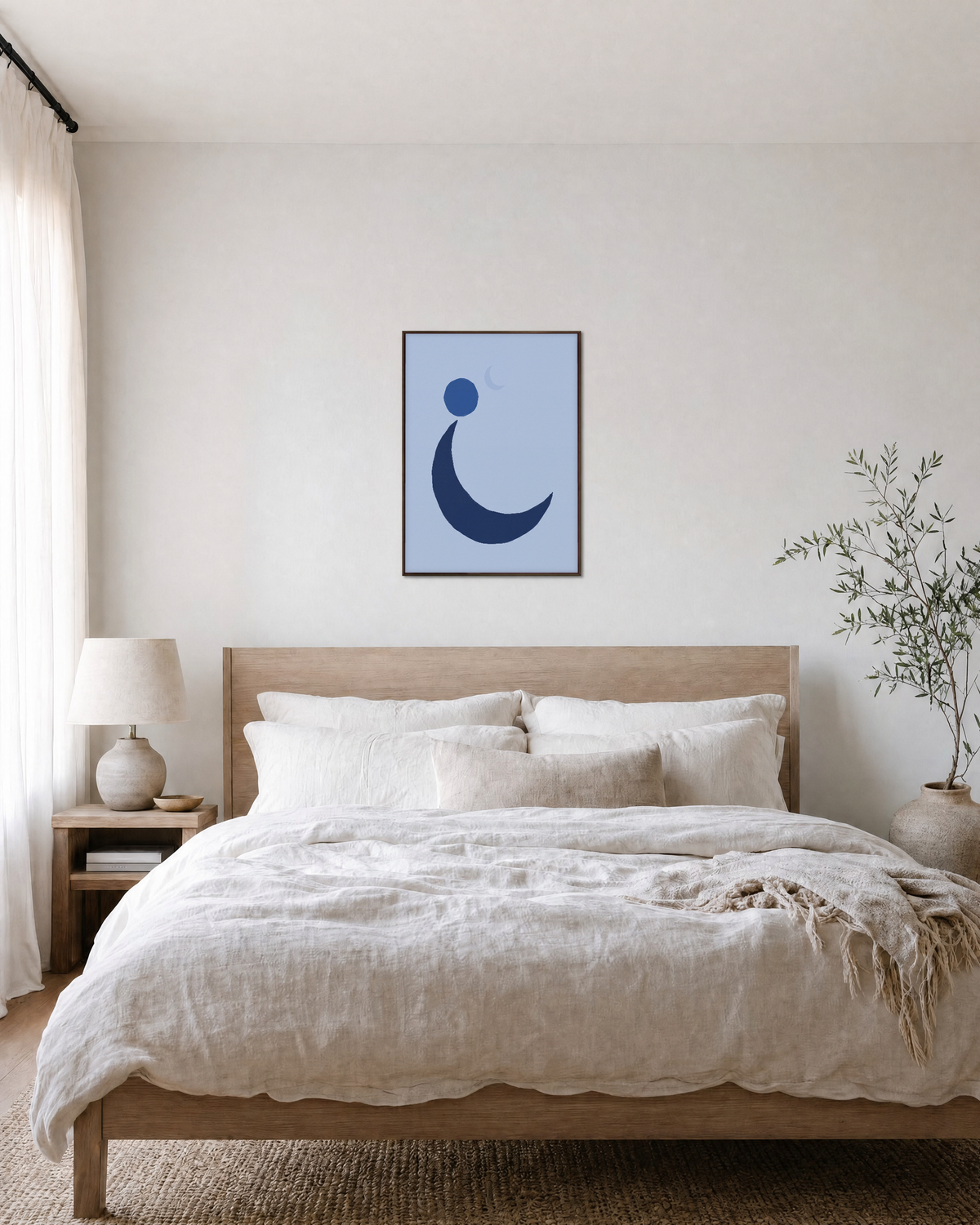 Navy Crescent with Blue Circle blue moon wall art: unframed print is shown framed for styling in a bedroom; frame not included
