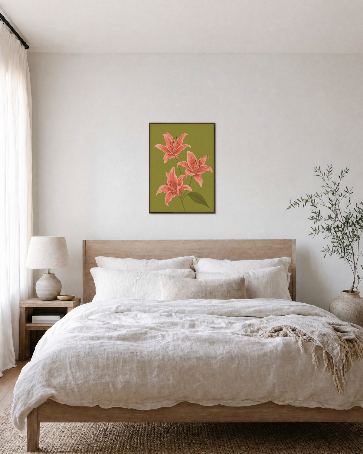 Three Coral Spotted Lilies One Olive Leaf Blade unframed print is shown framed for styling in a bedroom; frame not included