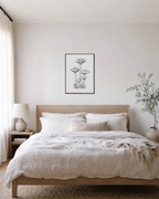 Mushroom Patch mushroom poster print: unframed print is shown framed for styling in a bedroom; frame not included