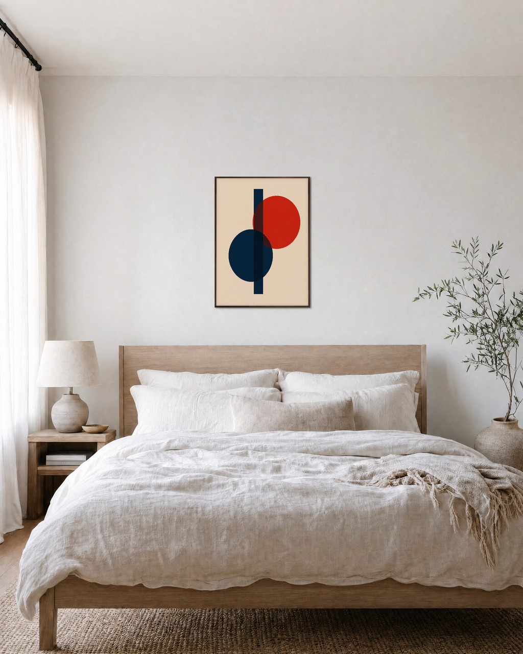 Two Circles One Rectangle Stack unframed print is shown framed for styling in a bedroom; frame not included