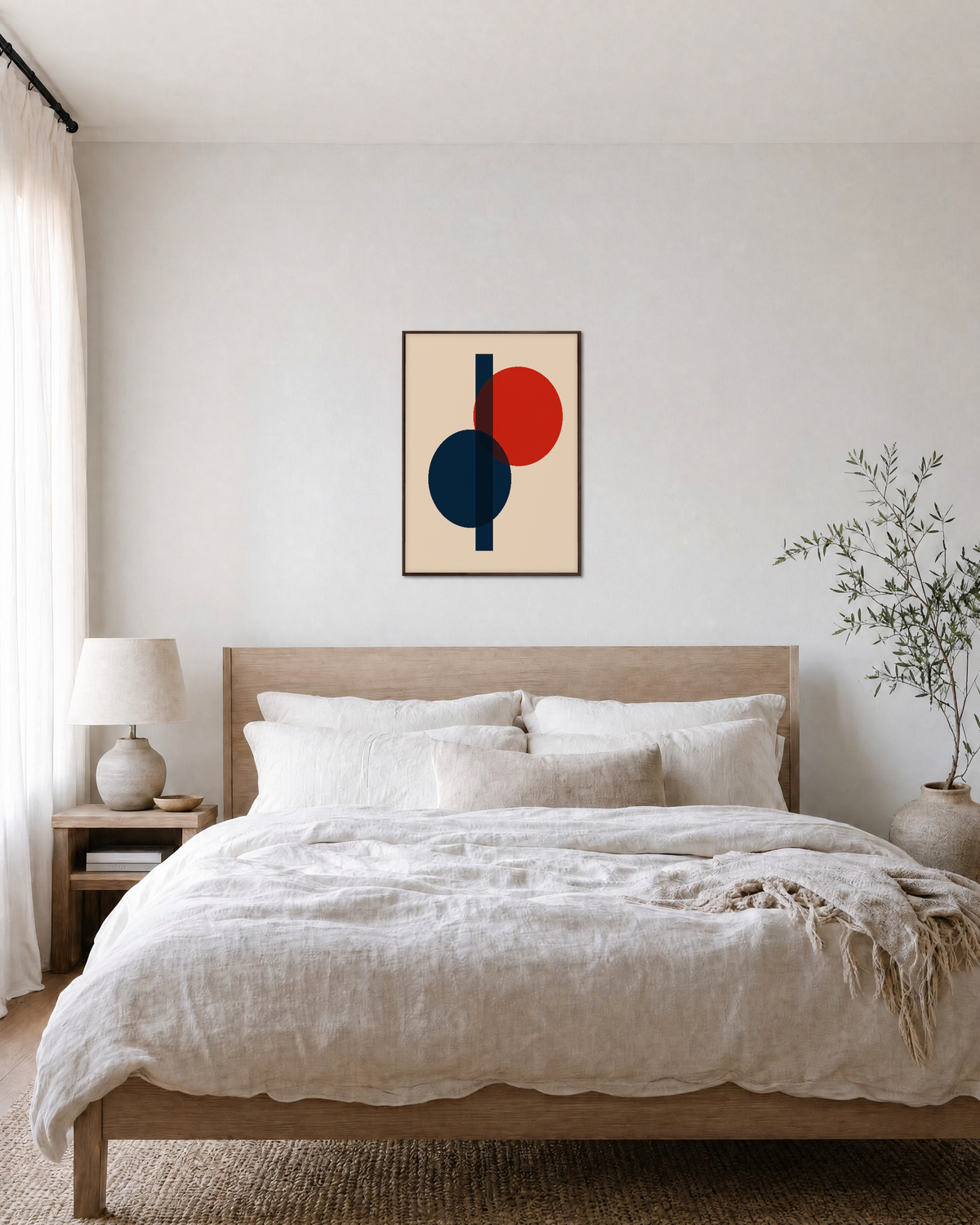 Two Circles One Rectangle Stack unframed print is shown framed for styling in a bedroom; frame not included