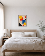 Primary Stack primary shape grid wall art: unframed print is shown framed for styling in a bedroom; frame not included