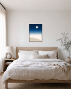Night Horizon unframed print is shown framed for styling in a bedroom; frame not included