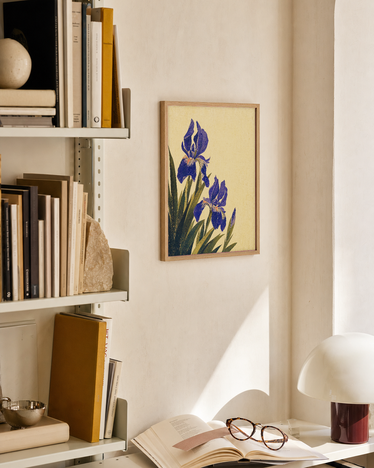 Iris Cluster at Lower Left purple iris flower study wall art print: unframed print is shown framed for styling in a library shelf; frame not included