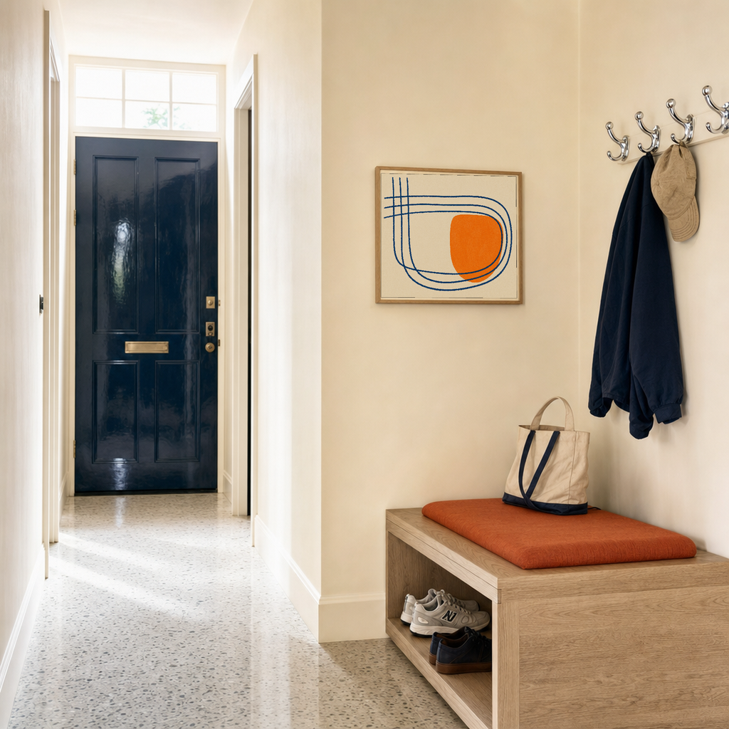 Orange Break navy line orange wall art: unframed print is shown framed for styling in a navy door entry hall; frame not included