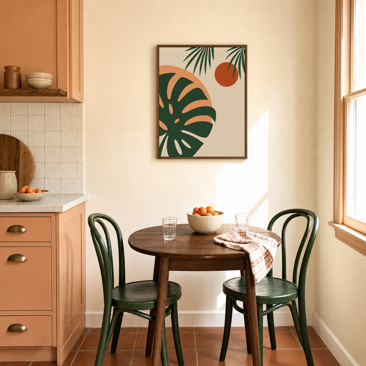 The Second Light monstera print: unframed print is shown framed for styling in a sunny peach kitchen corner; frame not included