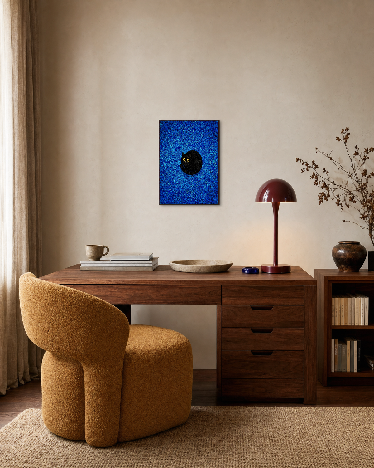 Spiral Cat curled black cat print: unframed print is shown framed for styling in a home office; frame not included