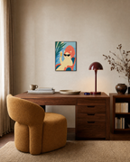 Cream Cat Spa Glass unframed print is shown framed for styling in a home office; frame not included
