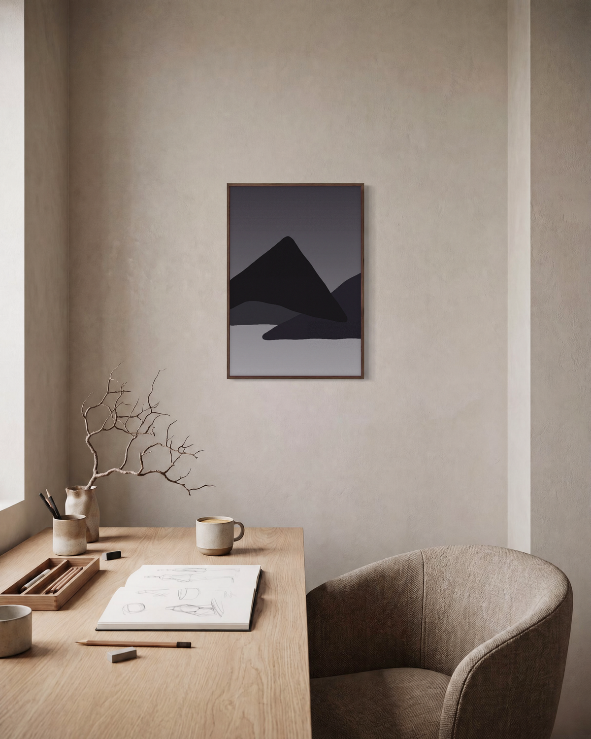 Layered Black Mountain Ridges black geometric wall art: unframed print is shown framed for styling in a home office; frame not included