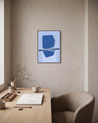 Azure Reflection unframed print is shown framed for styling in a home office; frame not included