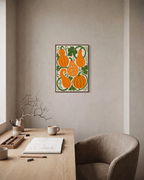 Vine Gourds orange gourd wall art: unframed print is shown framed for styling in a home office; frame not included