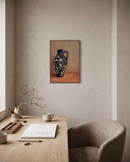 Black Amphora Motif unframed print is shown framed for styling in a home office; frame not included