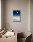 Ringed Planet Above Dunes navy blue night sky wall art: unframed print is shown framed for styling in a home office; frame not included