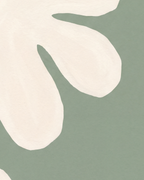 Close-up detail from Cream Cutouts Sage showing printed color and surface texture