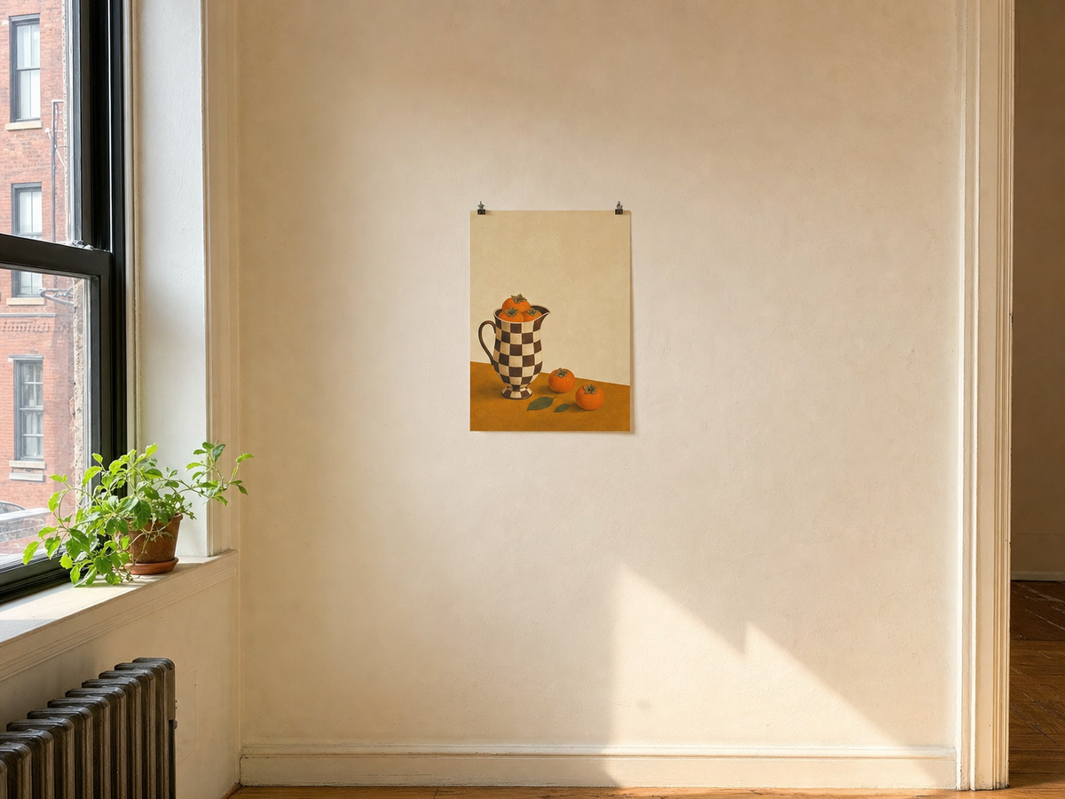 An unframed print clipped to a first-apartment wall